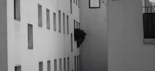 concrete building in black and white